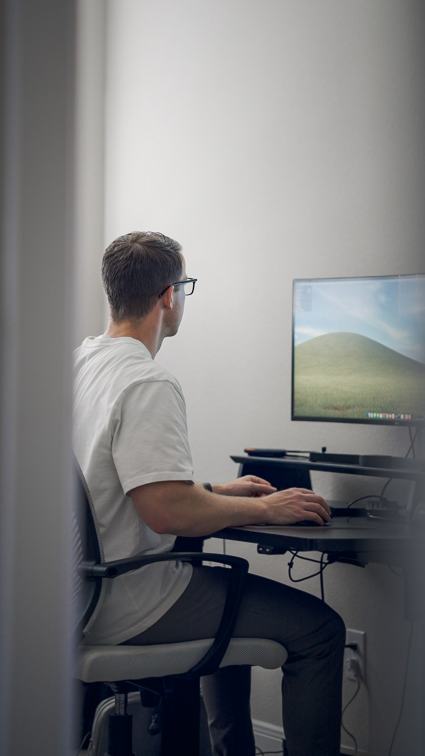 Dan at his desk — Confident Creator
